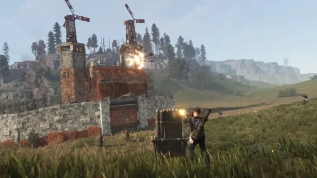 günstigen rust server mieten - unser vergleich | 11 Ein Spieler in Körperpanzerung feuert eine Waffe auf eine ummauerte, rostige Basis mit Windturbinen ab, während es zu Explosionen kommt – typische Action, die man beim Mieten eines Rust-Servers erlebt. Figuren sind auf der Wiese und in der Nähe des Gebäudes verstreut.